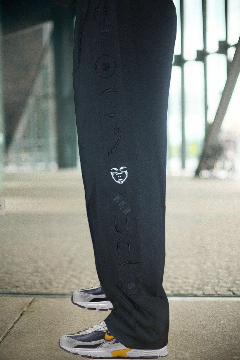 MERGE OF CURSES TRACKPANTS
